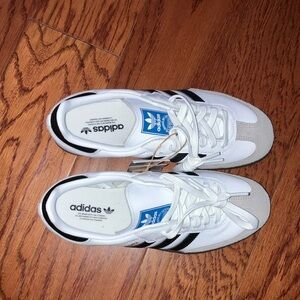 Adidas womens White and Black Sneakers(still available) never worn
